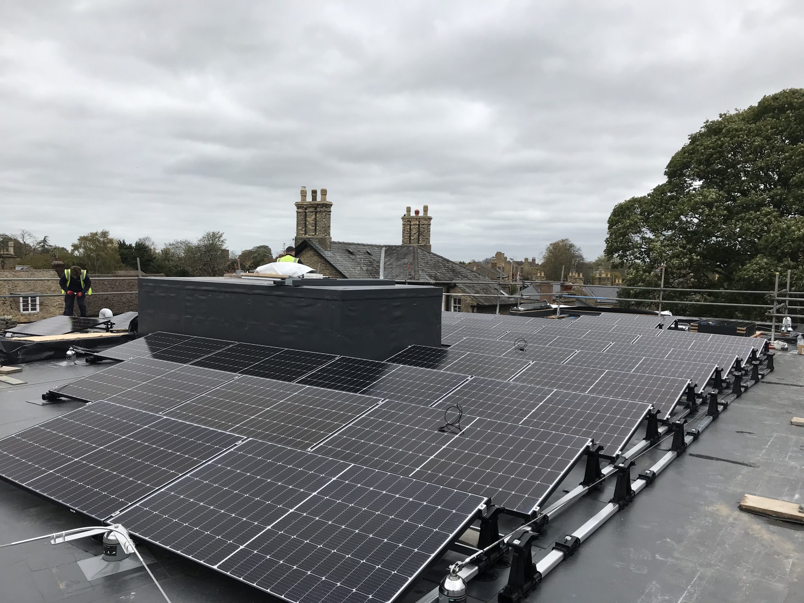 Solar panels being installed on the roof