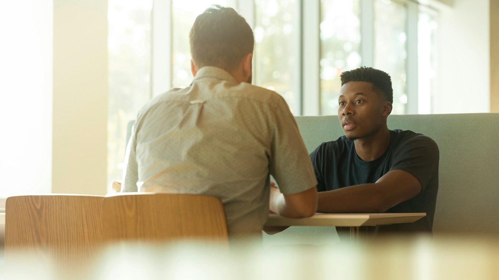 two men talking