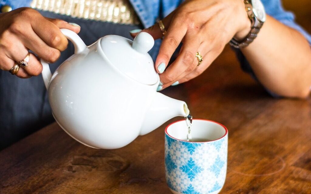 woman holding teapot