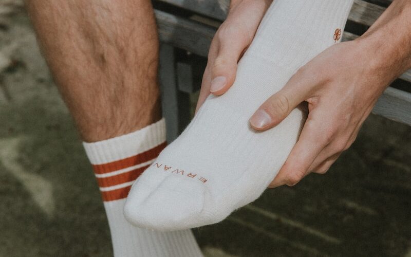 person wearing white nike socks