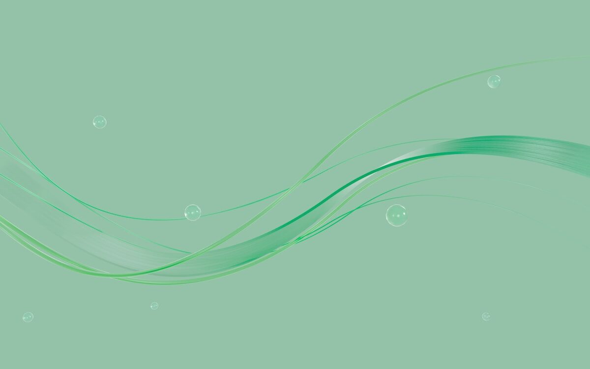 a green background with bubbles and waves